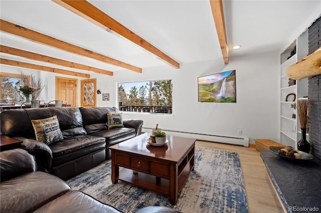 living room featuring a baseboard radiator, light hardwood / wood-style flooring, and beamed ceiling