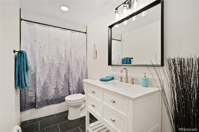 bathroom featuring a baseboard radiator, vanity, and toilet