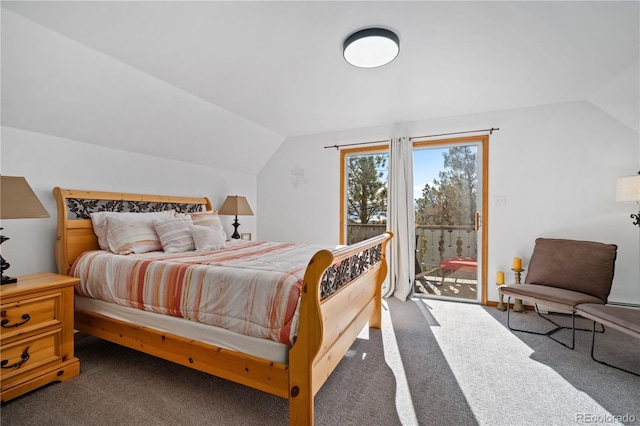 bedroom with dark carpet, access to exterior, and vaulted ceiling