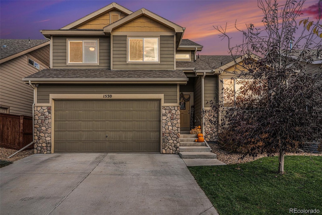 craftsman-style home with a garage