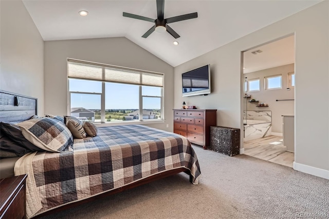 229 High Meadows Loop, Elizabeth, CO 80107 - bedroom featuring vaulted ceiling, light carpet, connected bathroom, and ceiling fan