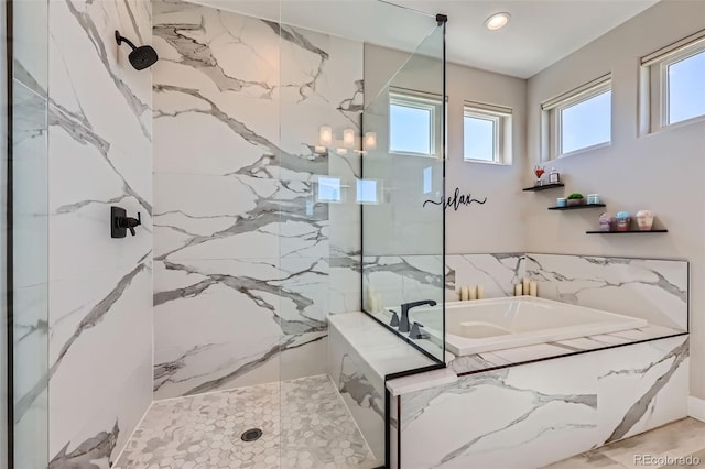 229 High Meadows Loop, Elizabeth, CO 80107 - full bath featuring a garden tub, a marble finish shower, and recessed lighting