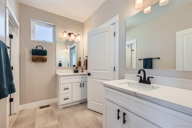 229 High Meadows Loop, Elizabeth, CO 80107 - full bath featuring two vanities and tile patterned floors