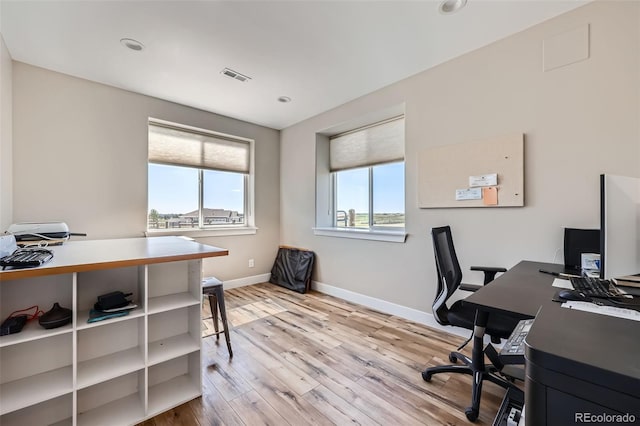 229 High Meadows Loop, Elizabeth, CO 80107 - home office featuring light wood-style floors and recessed lighting