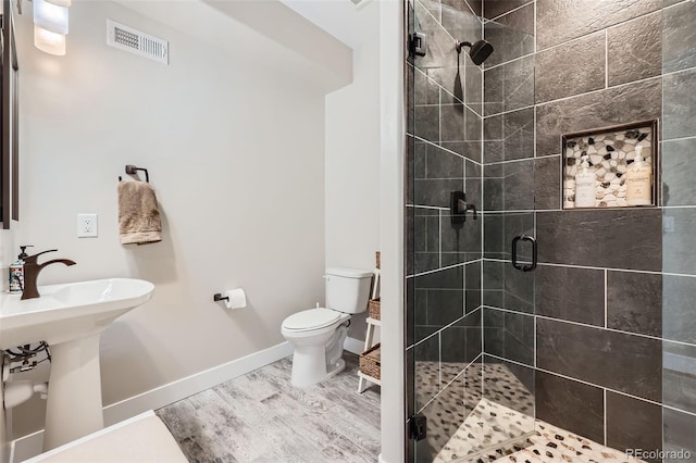 229 High Meadows Loop, Elizabeth, CO 80107 - full bathroom with a stall shower and wood finished floors