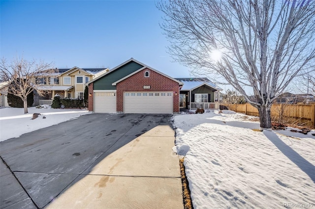 view of front of property featuring a garage