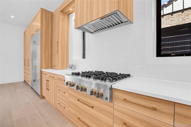 1491 S York St, Denver, CO 80210 - kitchen featuring stainless steel appliances, light brown cabinets, and modern cabinets