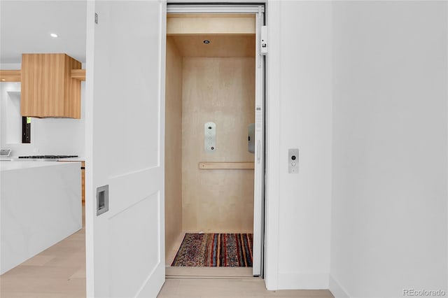 1491 S York St, Denver, CO 80210 - hallway with elevator and recessed lighting