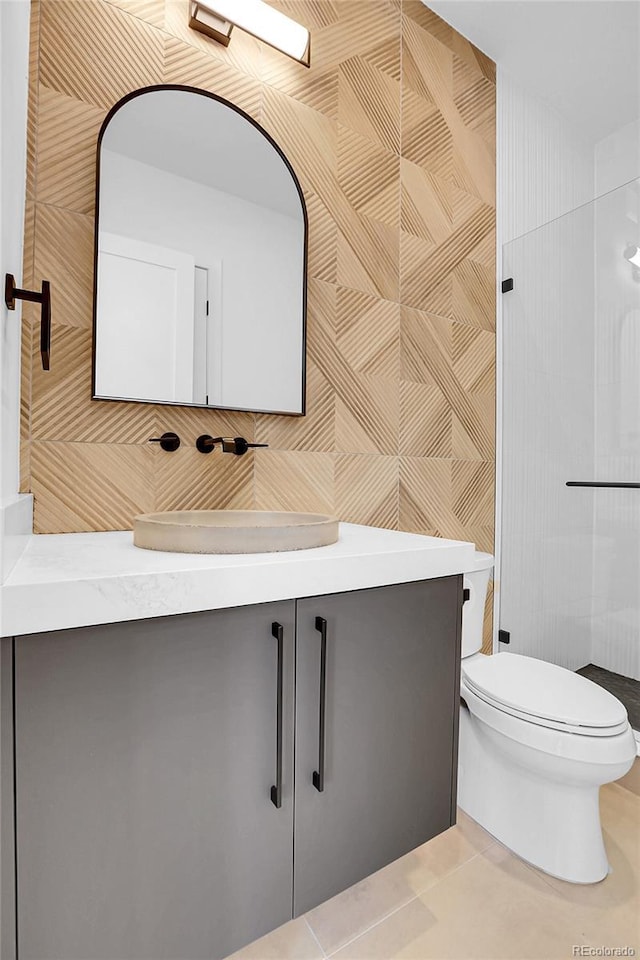 1491 S York St, Denver, CO 80210 - bathroom featuring vanity and tile patterned floors