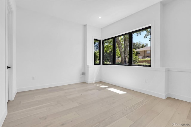 1491 S York St, Denver, CO 80210 - spare room with light wood-style flooring and recessed lighting