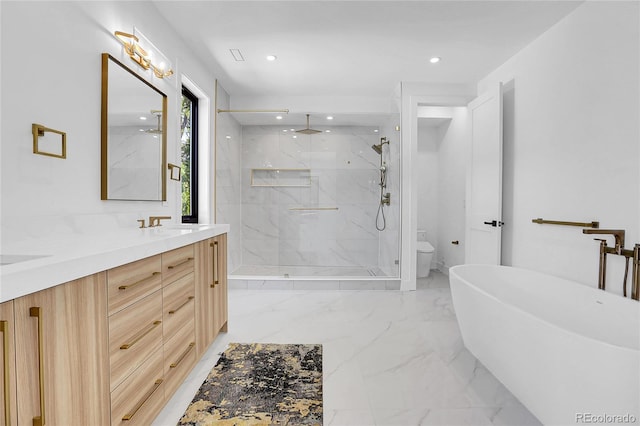 1491 S York St, Denver, CO 80210 - full bath with a marble finish shower, double vanity, a freestanding bath, marble finish flooring, and recessed lighting