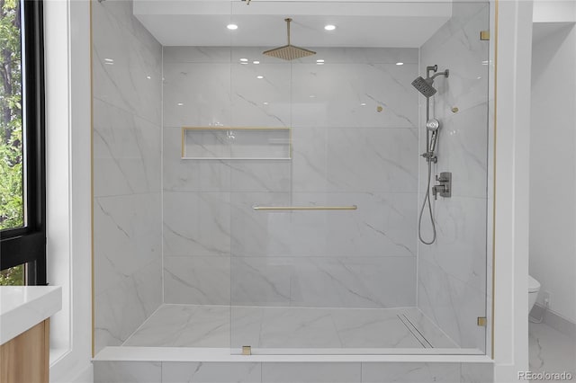 1491 S York St, Denver, CO 80210 - bathroom featuring a marble finish shower and marble finish flooring