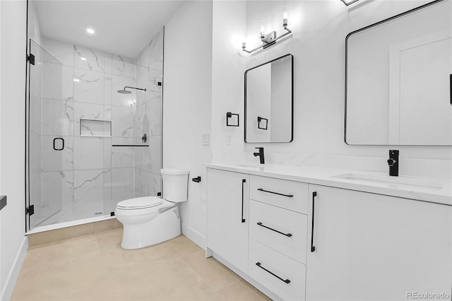 1491 S York St, Denver, CO 80210 - bathroom featuring a marble finish shower, double vanity, and recessed lighting