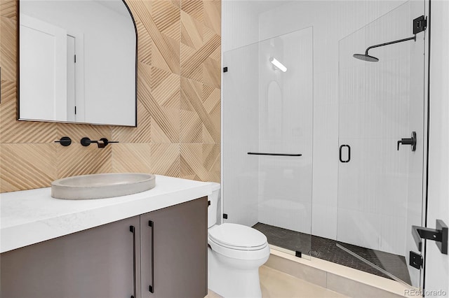 1491 S York St, Denver, CO 80210 - full bath featuring a stall shower, vanity, and tasteful backsplash