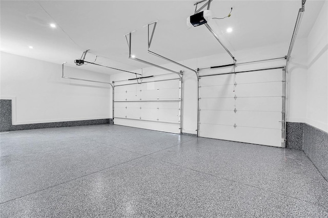 1491 S York St, Denver, CO 80210 - garage featuring a garage door opener