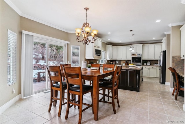 tiled dining room with a chandelier and ornamental molding