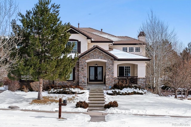 view of property with french doors