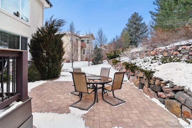 view of snow covered patio