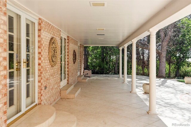 2209 Green Oaks Ln, Greenwood Village, CO 80121 - view of patio / terrace featuring french doors