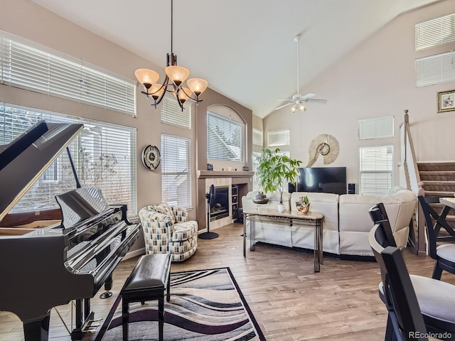 2676 S Troy Ct, Aurora, CO 80014 - living area featuring plenty of natural light, a fireplace, and stairway