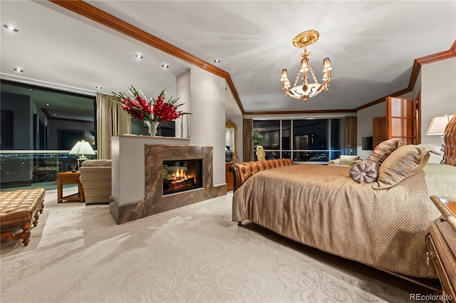 carpeted bedroom featuring crown molding, a high end fireplace, and an inviting chandelier