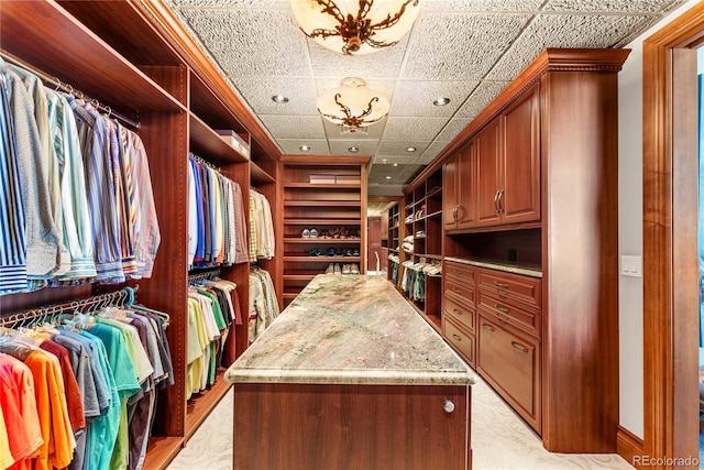 walk in closet featuring a drop ceiling