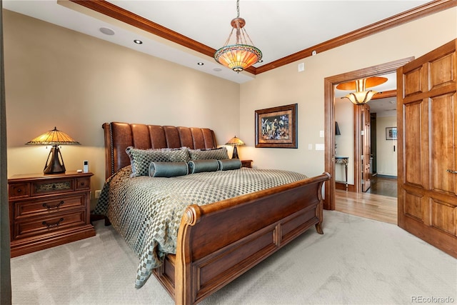 carpeted bedroom with ornamental molding