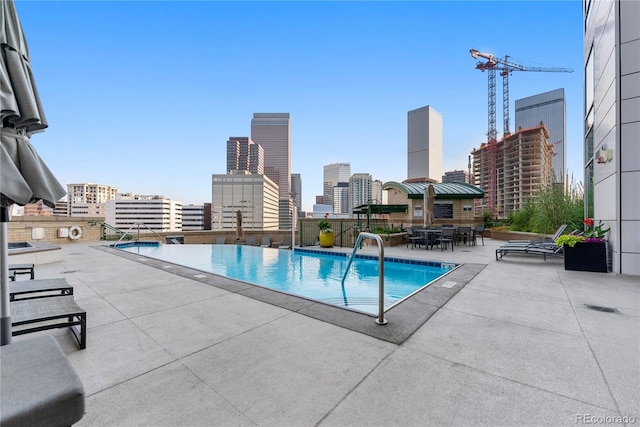 view of pool with a patio area