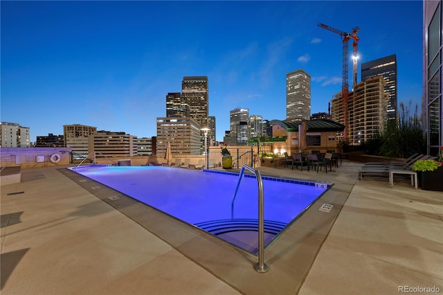 view of pool featuring a patio