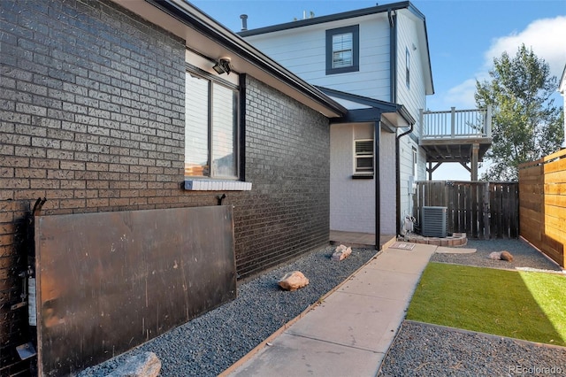 3807 S Atchison Way, Aurora, CO 80014 - view of home's exterior with brick siding and a balcony