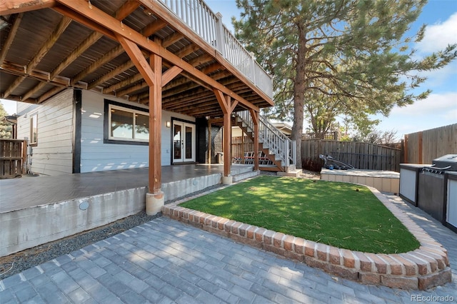 3807 S Atchison Way, Aurora, CO 80014 - fenced backyard with a patio, stairs, and french doors