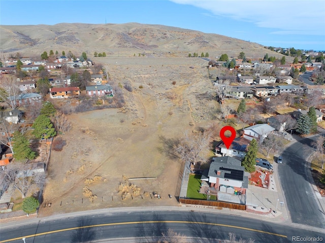 aerial view with a mountain view and a residential view