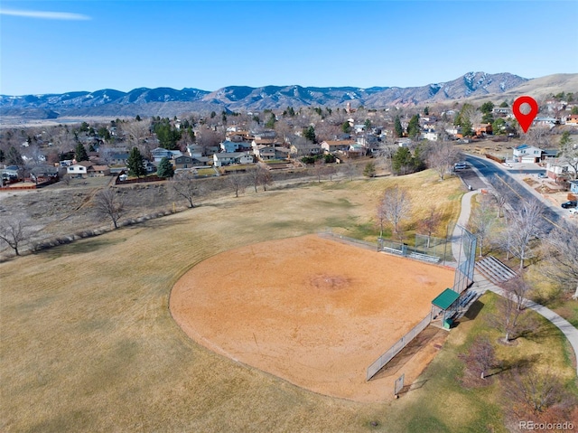 drone / aerial view featuring a mountain view