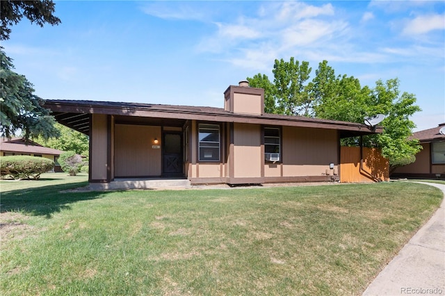 3720 S Fairplay Way, Aurora, CO 80014 - ranch-style home featuring a front yard, a chimney, and cooling unit