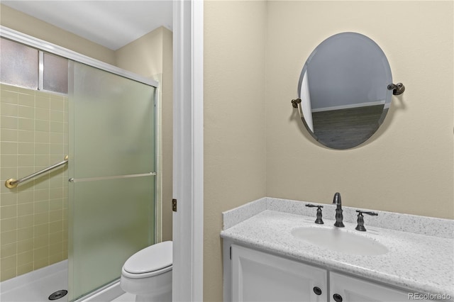 3720 S Fairplay Way, Aurora, CO 80014 - bathroom with a shower stall, toilet, and vanity