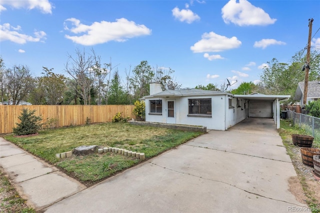 7760 Magnolia St, Commerce City, CO 80022 - bungalow featuring concrete driveway, stucco siding, a carport, and a chimney