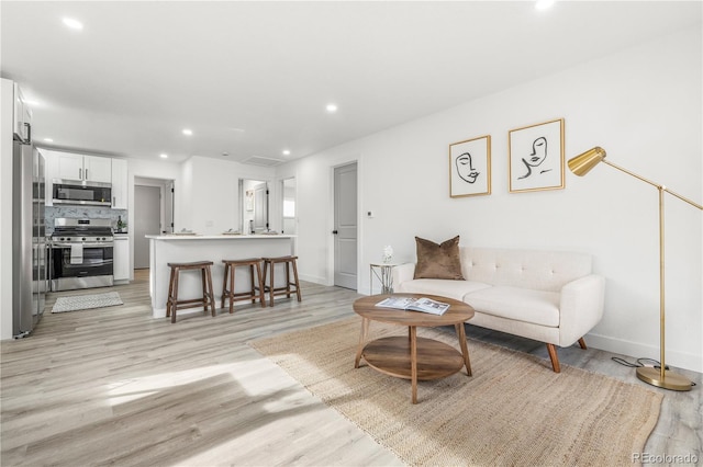 living room featuring light hardwood / wood-style flooring