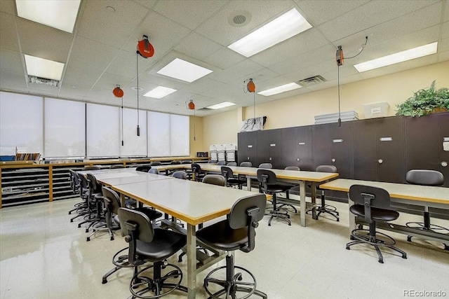 office area featuring a paneled ceiling