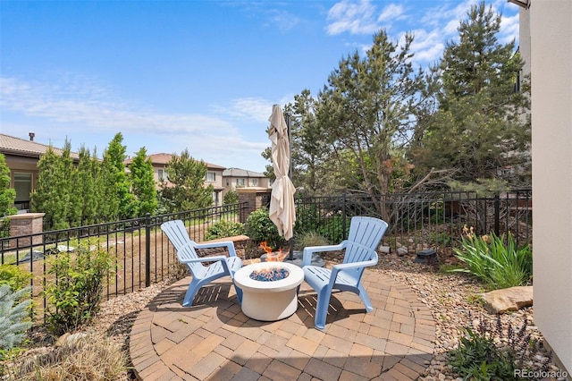 10468 Ladera Dr, Lone Tree, CO 80124 - view of patio featuring a fire pit