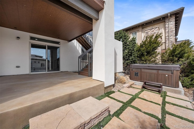 10468 Ladera Dr, Lone Tree, CO 80124 - view of patio with a hot tub and stairs