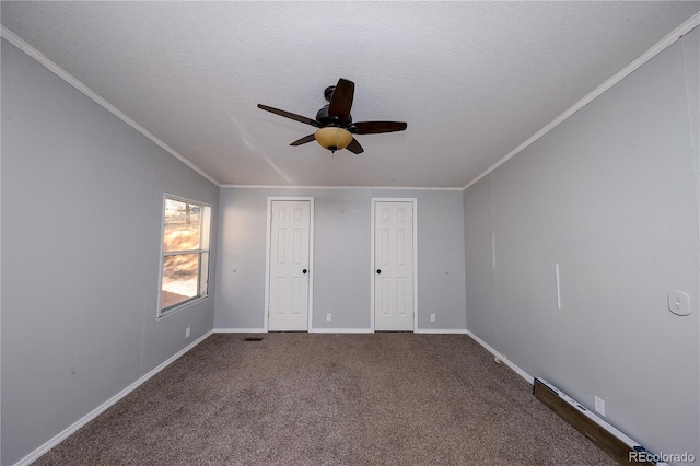 unfurnished bedroom featuring ceiling fan, crown molding, carpet flooring, and a textured ceiling