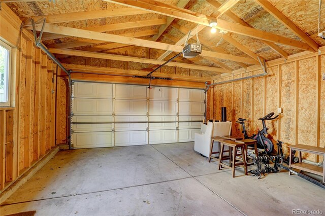 garage featuring a garage door opener