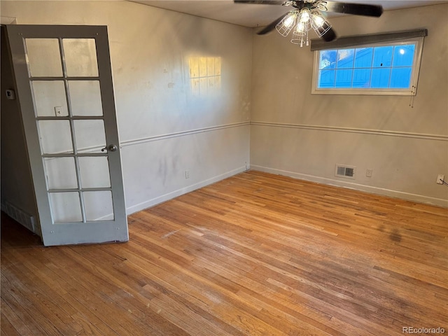 unfurnished room featuring ceiling fan and light hardwood / wood-style flooring