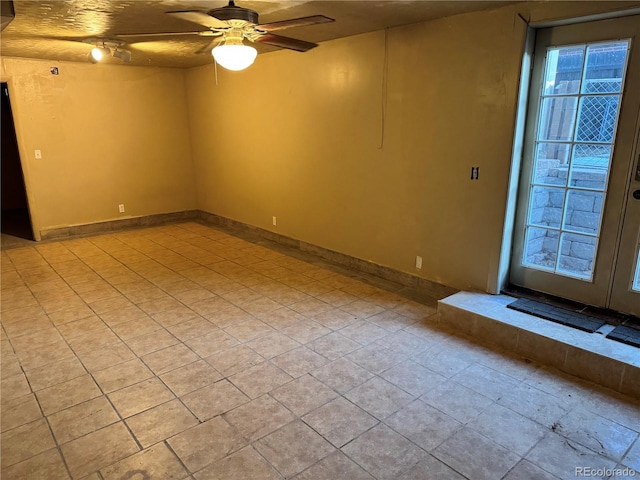 unfurnished room featuring ceiling fan