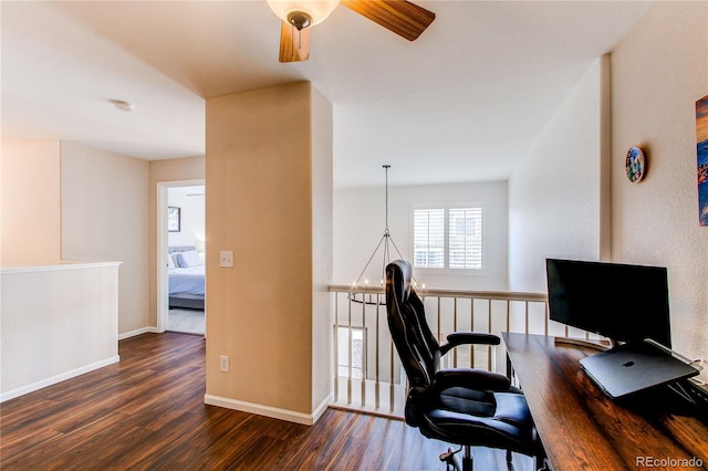 office space with baseboards, ceiling fan, and dark wood-style floors