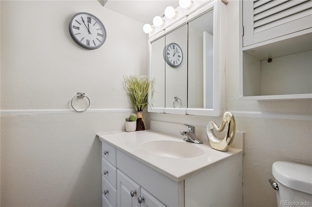 1155 N Ash St Unit 1204, Denver, CO 80220 - bathroom featuring vanity and toilet