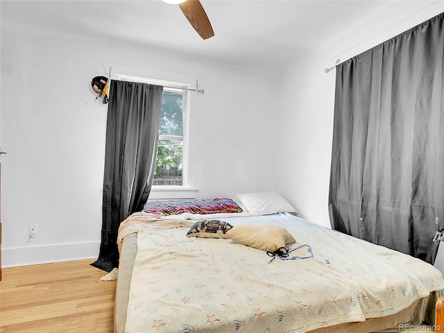 1561 Clinton St, Aurora, CO 80010 - bedroom featuring light wood-style flooring and a ceiling fan