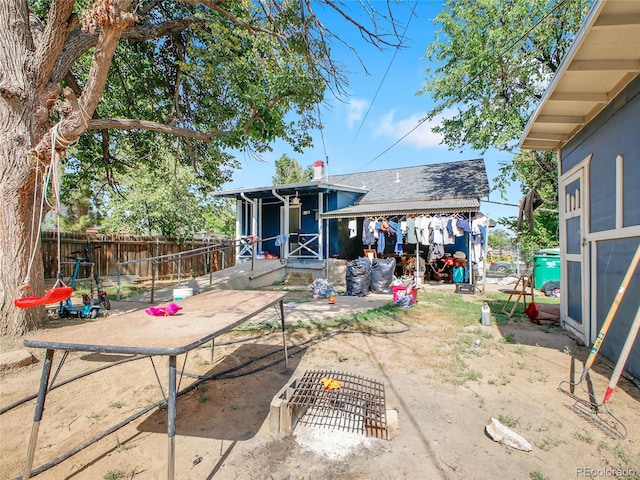 1561 Clinton St, Aurora, CO 80010 - back of house featuring a patio