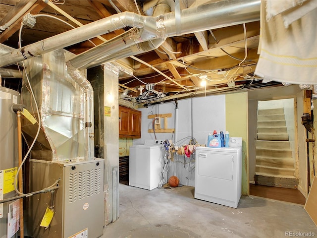 1561 Clinton St, Aurora, CO 80010 - unfinished below grade area featuring independent washer and dryer and water heater