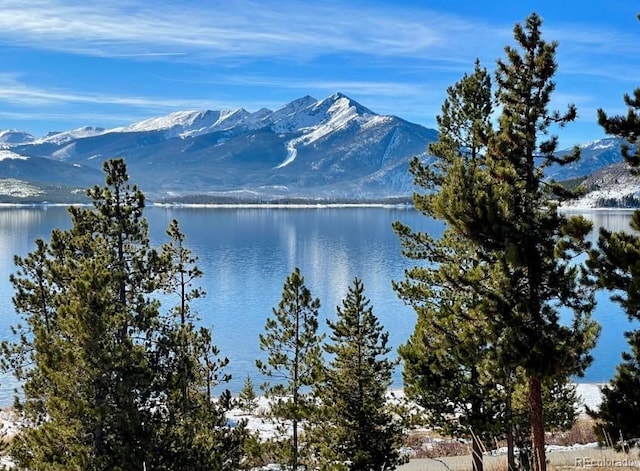 view of mountain feature featuring a water view